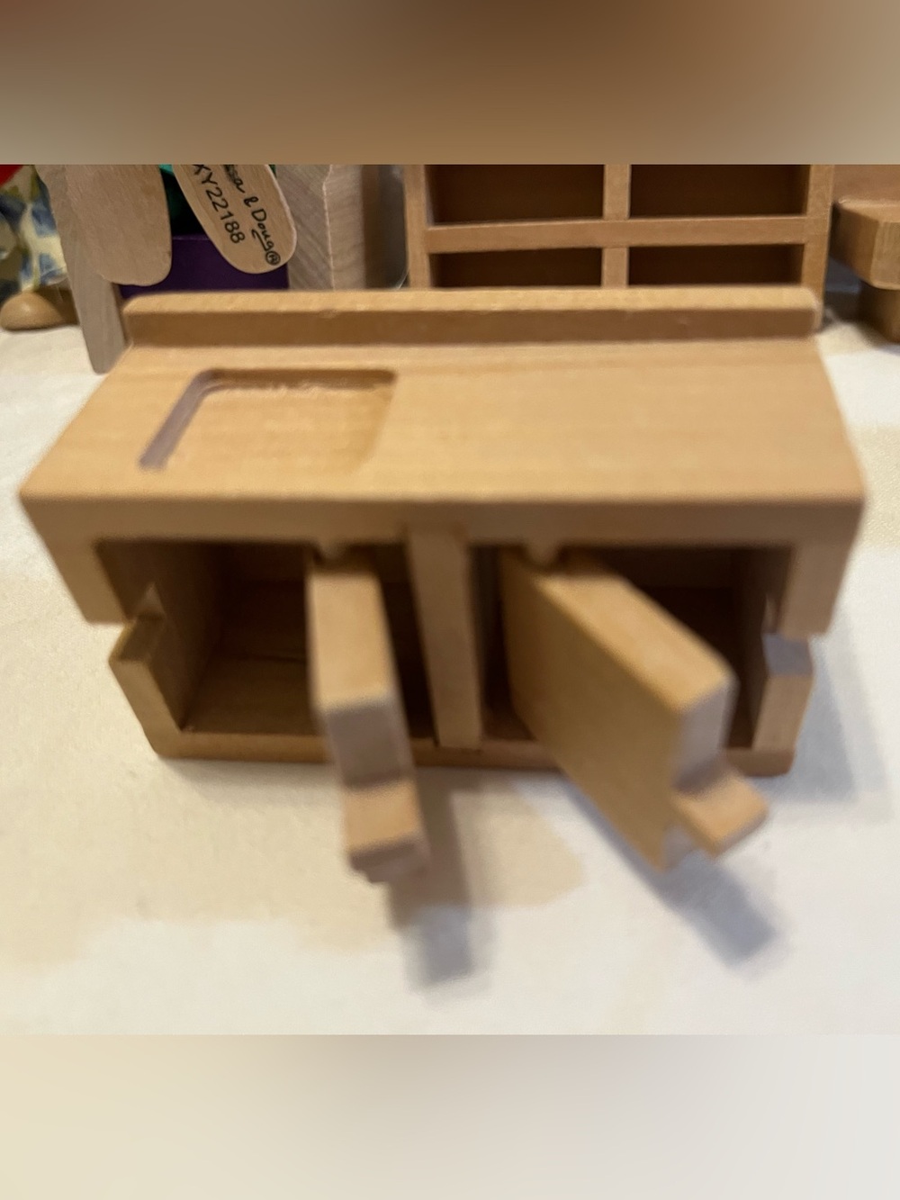 Melissa & Doug Wooden Dollhouse Furniture Set with Purple Accents and Two Dolls - Picture 5 of 7
